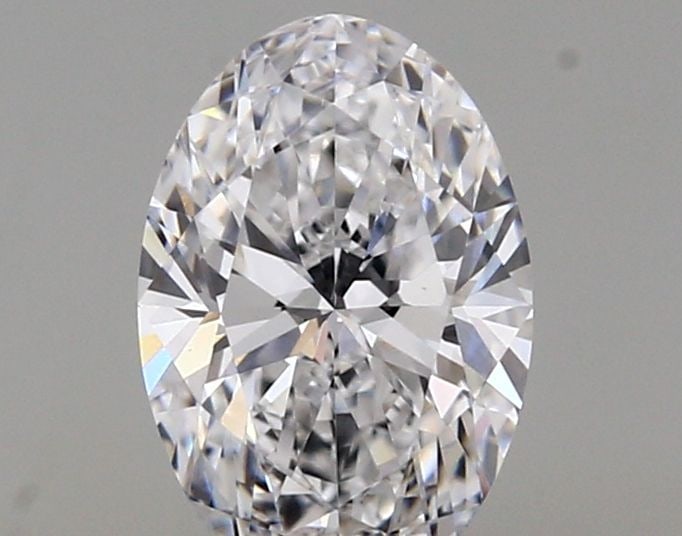 IGI Oval Diamond 1.23ct D VVS2: IGI Oval Diamond 1.23ct D VVS2 Experience the brilliance of a lab-grown diamond, certified by IGI as a D color, VVS2 clarity, and boasting exceptional cut, polish, and symmetry. This 1.23ct oval gemst