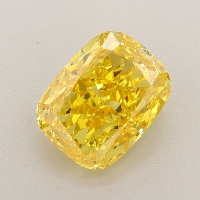 Loose Lab Diamond - IGI Cushion Brilliant 0.93ct Fancy Vivid Yellow VVS2: Loose Lab Diamond - IGI Cushion Brilliant 0.93ct Fancy Vivid Yellow VVS2 Experience the warmth and vibrancy of a genuine lab-grown diamond, certified by IGI as Fancy Vivid Yellow with exceptional