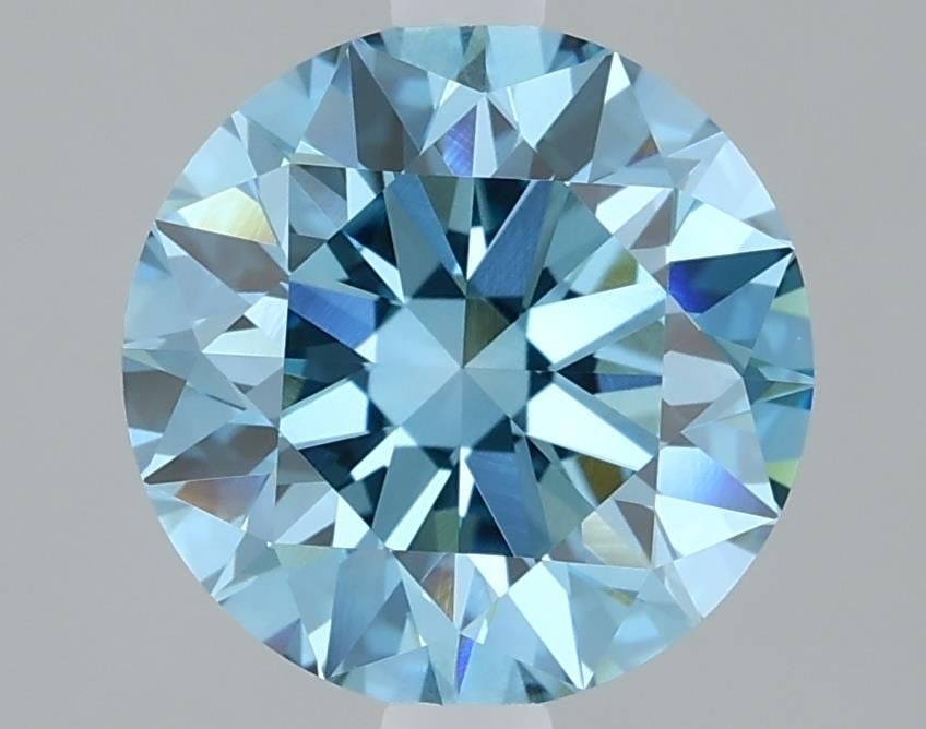 IGI Round 2.12ct Fancy Vivid Blue VVS2 Loose Lab Diamond: IGI Round 2.12ct Fancy Vivid Blue VVS2 Loose Lab Diamond Experience the breathtaking beauty of a Fancy Vivid Blue lab-grown diamond, boasting an exceptional 2.12ct cut with EX polish and symmetry. Thi