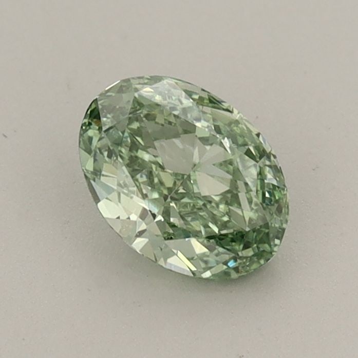 IGI Oval 0.6ct Fancy Vivid Green VVS2 Loose Lab Diamond: IGI Oval 0.6ct Fancy Vivid Green VVS2 Loose Lab Diamond Experience the breathtaking beauty of a lab-grown diamond, certified by IGI as Fancy Vivid Green with exceptional clarity and polish. This 0.6ct