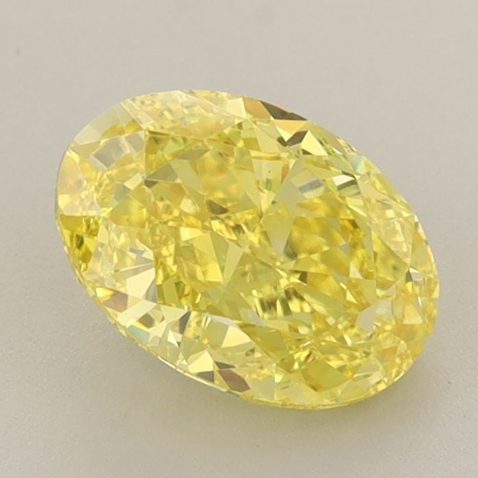 IGI Oval 1.72ct Fancy Vivid Yellow VVS1 Loose Lab Diamond: IGI Oval 1.72ct Fancy Vivid Yellow VVS1 Loose Lab Diamond Experience the vibrant beauty of nature in this stunning 1.72ct Fancy Vivid Yellow VVS1 lab-grown diamond, certified by IGI and boasting excep