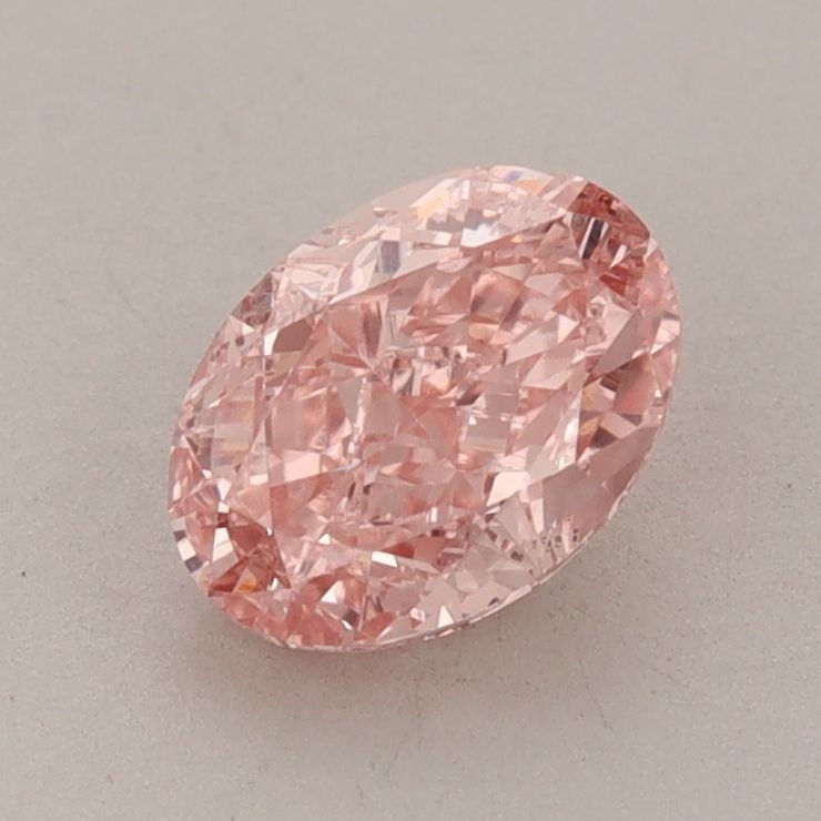 IGI Oval 1.1ct Fancy Vivid Pink VVS2 Loose Lab Diamond: IGI Oval 1.1ct Fancy Vivid Pink VVS2 Loose Lab Diamond A stunning Fancy Vivid Pink lab diamond, certified by the International Gemological Institute (IGI), boasts exceptional clarity and color with a