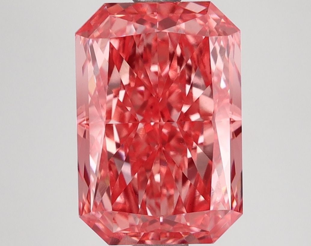 IGI Radiant 3.83ct Fancy Vivid Pink VVS2 Loose Lab Diamond: IGI Radiant 3.83ct Fancy Vivid Pink VVS2 Loose Lab Diamond Experience the rare beauty of a lab-grown Fancy Vivid Pink diamond, certified by IGI as VVS2 in clarity and EX in polish and symmetry. This