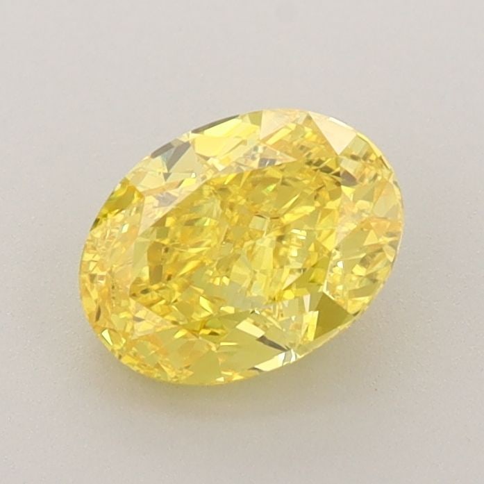IGI Oval 1.03ct Fancy Vivid Yellow VVS1 Loose Lab Diamond: IGI Oval 1.03ct Fancy Vivid Yellow VVS1 Loose Lab Diamond Experience the brilliance of nature's own sunshine with this stunning 1.03ct Fancy Vivid Yellow VVS1 lab-grown diamond, certified by the Inter