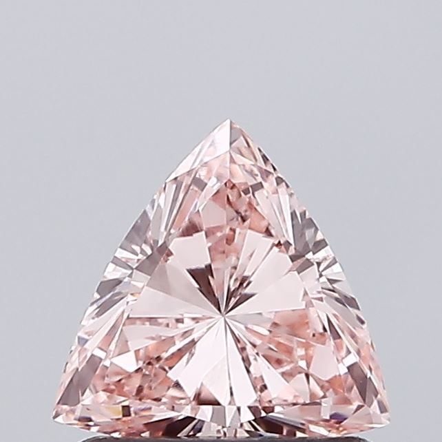 IGI Triangular 0.7ct Fancy Intense Pink VVS2 Loose Lab Diamond: IGI Triangular 0.7ct Fancy Intense Pink VVS2 Loose Lab Diamond Experience the rare beauty of a Fancy Intense Pink diamond, one of the most coveted colors in the world of gemstones. This stunning