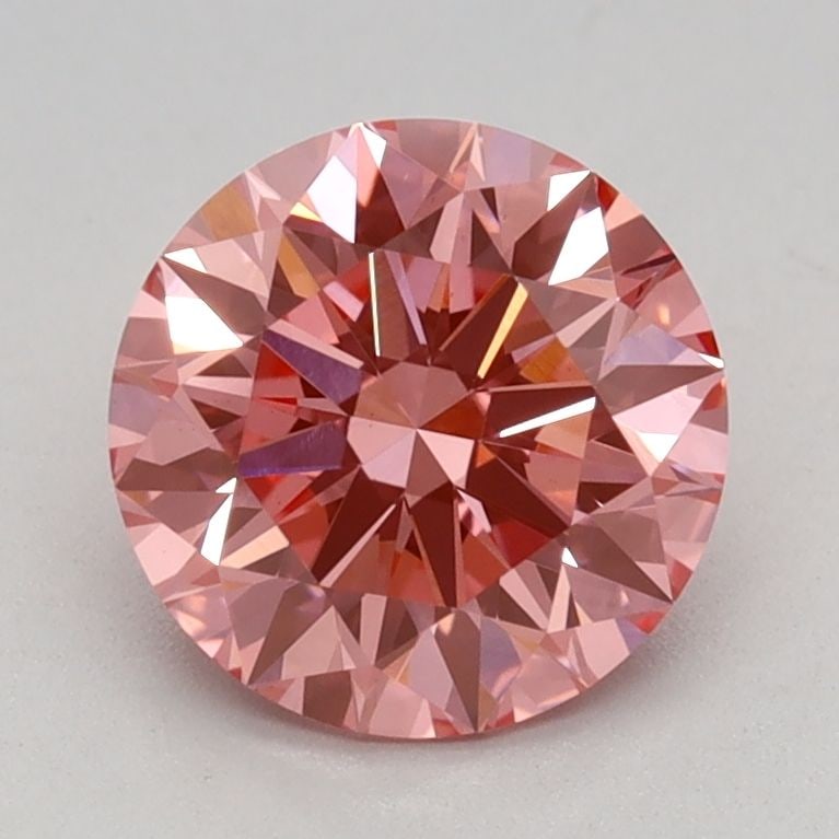 IGI Round 1.14ct Fancy Vivid Pink VVS2 Ideal Loose Lab Diamond: IGI Round 1.14ct Fancy Vivid Pink VVS2 Ideal Loose Lab Diamond This stunning Fancy Vivid Pink diamond boasts exceptional clarity and cut, with a vivid pink hue that shines brightly in the light. Certi