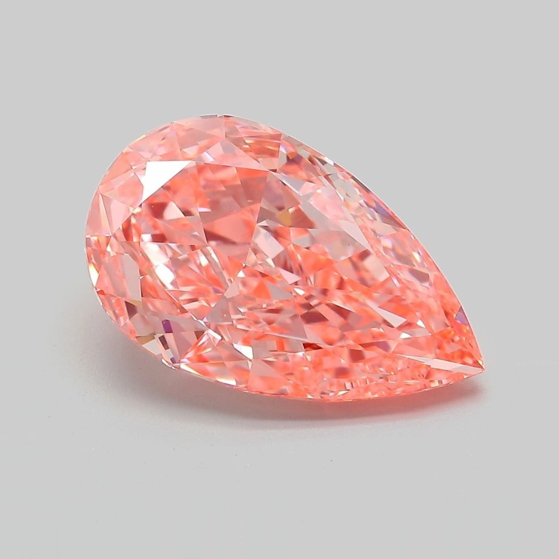 Loose Lab Diamond - IGI Pear 5.33ct Fancy Vivid Pink VVS2: Loose Lab Diamond - IGI Pear 5.33ct Fancy Vivid Pink VVS2 Experience the rare beauty of a lab-grown diamond, certified by the International Gemological Institute (IGI) as Fancy Vivid Pink, with except
