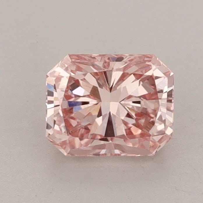 IGI Radiant 0.9ct Fancy Vivid Pink VVS2 Loose Lab Diamond: IGI Radiant 0.9ct Fancy Vivid Pink VVS2 Loose Lab Diamond Experience the beauty of lab-grown luxury with this stunning 0.9ct Fancy Vivid Pink VVS2 diamond, boasting exceptional clarity and a vibrant