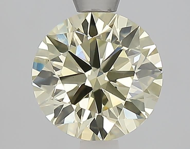 IGI Round 1.55ct Fancy Light Yellow VVS2 Loose Lab Diamond: IGI Round 1.55ct Fancy Light Yellow VVS2 Loose Lab Diamond This exquisite IGI certified lab diamond boasts a vibrant Fancy Light Yellow hue, graded VVS2 for exceptional clarity and cut to perfection,
