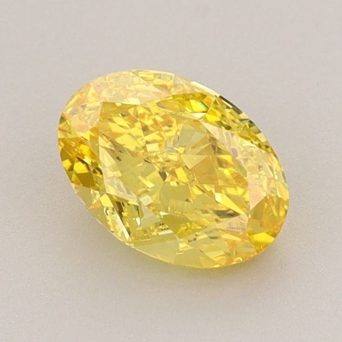 IGI Oval 1.01ct Fancy Vivid Yellow VVS2 Loose Lab Diamond: IGI Oval 1.01ct Fancy Vivid Yellow VVS2 Loose Lab Diamond Experience the vibrant beauty of nature in this stunning 1.01ct Fancy Vivid Yellow VVS2 loose lab diamond, certified by IGI and grown with unp