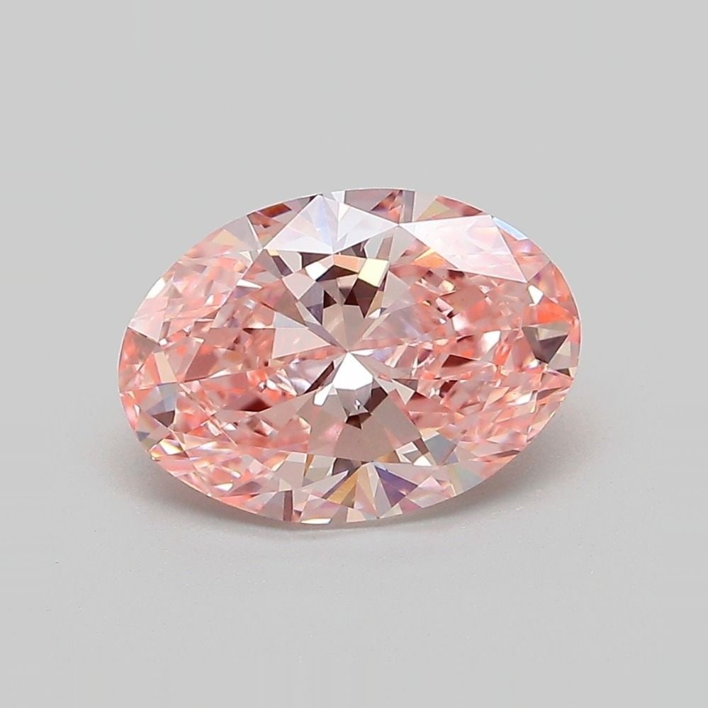IGI Oval 2.44ct Fancy Vivid Pink VVS2 Loose Lab Diamond: IGI Oval 2.44ct Fancy Vivid Pink VVS2 Loose Lab Diamond Experience the rarity of nature in this exquisite 2.44ct Fancy Vivid Pink VVS2 lab-grown diamond, boasting exceptional clarity and polish. Its v