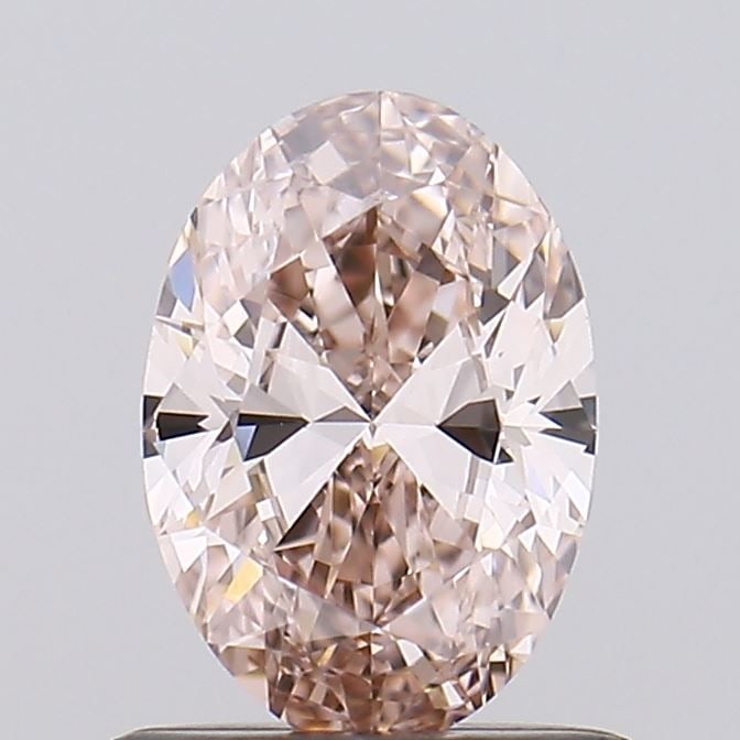 Fancy Light Brown VVS2 Oval Diamond 0.58ct Loose: Fancy Light Brown VVS2 Oval Diamond 0.58ct Loose Experience the unique charm of this Fancy Light Brown VVS2 Oval Diamond, boasting an exceptional 0.58 carat weight and flawless EX polish. Grown in a l
