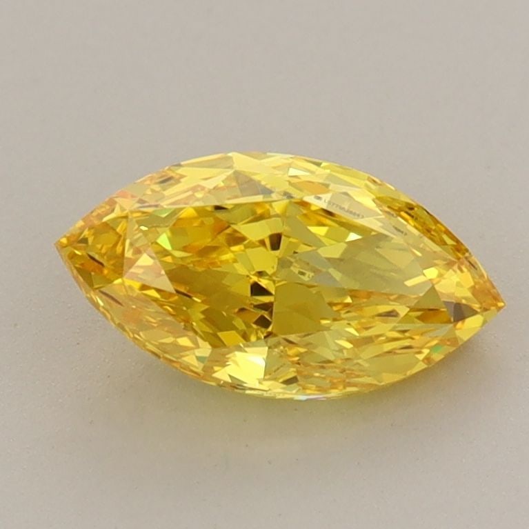 IGI Marquise 1.05ct Fancy Vivid Yellow VVS1 Loose Lab Diamond: IGI Marquise 1.05ct Fancy Vivid Yellow VVS1 Loose Lab Diamond A true gem for the discerning collector, this 1.05ct Fancy Vivid Yellow VVS1 loose lab diamond boasts exceptional color and clarity, makin