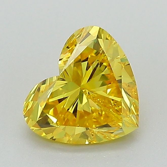 Loose Lab Diamond - IGI Heart 1.02ct Fancy Vivid Yellow VVS2: Loose Lab Diamond - IGI Heart 1.02ct Fancy Vivid Yellow VVS2 A rare and radiant gem, this 1.02ct Fancy Vivid Yellow Lab Diamond boasts exceptional clarity with its VVS2 rating, paired with a vibrant c