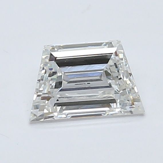 IGI Trapezoid 0.69ct E VVS2 Loose Lab Diamond: IGI Trapezoid 0.69ct E VVS2 Loose Lab Diamond Experience the beauty of a lab-grown diamond, certified by IGI as VVS2 clarity and boasting an exceptional color grade of E. This 0.69ct trapezoid cut gem