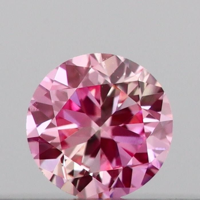 IGI Round 0.1ct Fancy Intense Pink VVS2 Loose Lab Diamond: IGI Round 0.1ct Fancy Intense Pink VVS2 Loose Lab Diamond Experience the rare beauty of a Fancy Intense Pink diamond, one of the most coveted colors in diamonds. This 0.1ct lab-grown gem boasts except