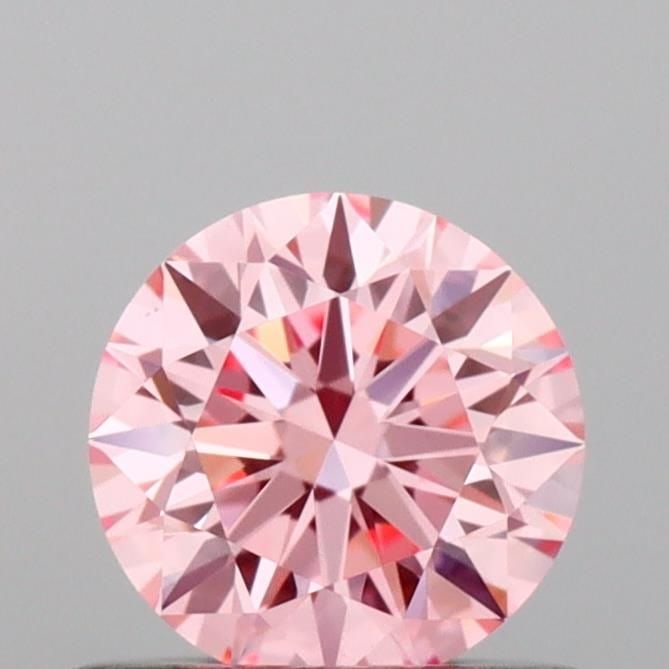 IGI Round 0.57ct Fancy Vivid Pink VVS2 Ideal Loose Lab Diamond: IGI Round 0.57ct Fancy Vivid Pink VVS2 Ideal Loose Lab Diamond Experience the rare beauty of a Fancy Vivid Pink diamond, one of the most coveted colors in the world of gemstones. This stunning 0.57ct