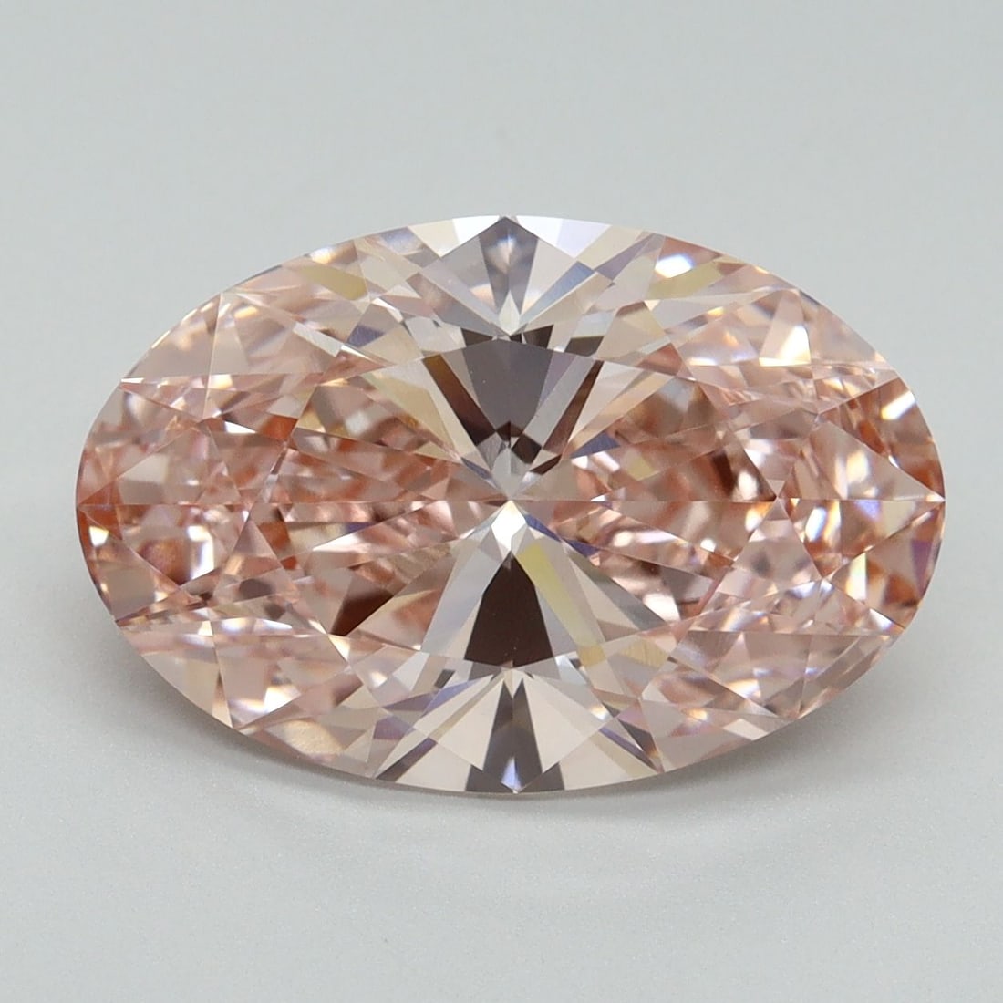 IGI Oval 5.05ct Fancy Vivid Pink VVS2 Loose Lab Diamond: IGI Oval 5.05ct Fancy Vivid Pink VVS2 Loose Lab Diamond Experience the rare beauty of a Fancy Vivid Pink lab-grown diamond, boasting exceptional clarity and color intensity in its 5.05ct oval shape. C