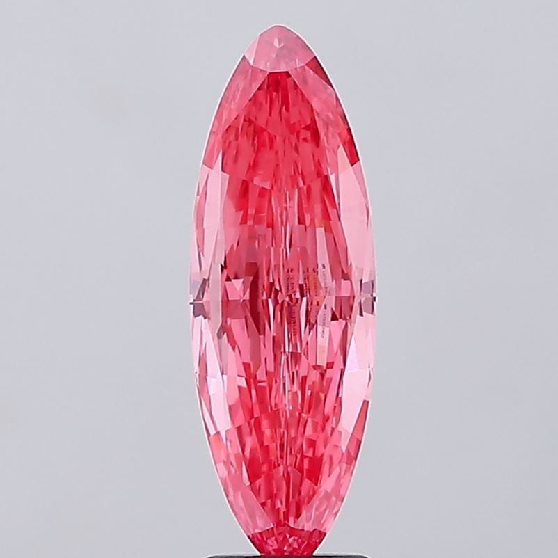 IGI Marquise 3.04ct Fancy Vivid Pink VVS2 Loose Lab Diamond: IGI Marquise 3.04ct Fancy Vivid Pink VVS2 Loose Lab Diamond Experience the rare beauty of a Fancy Vivid Pink lab-grown diamond, boasting exceptional clarity and cut quality in its 3.04ct