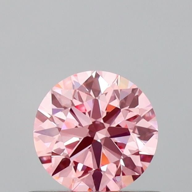 IGI Round 0.53ct Fancy Vivid Pink VVS2 Ideal Loose Lab Diamond: IGI Round 0.53ct Fancy Vivid Pink VVS2 Ideal Loose Lab Diamond A stunning Fancy Vivid Pink diamond, certified by the International Gemological Institute (IGI), boasts exceptional clarity and polish wi