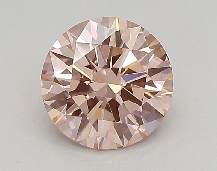 IGI Round 0.64ct Fancy Vivid Pink VVS2 Loose Lab Diamond: IGI Round 0.64ct Fancy Vivid Pink VVS2 Loose Lab Diamond Experience the unparalleled beauty of this 0.64ct Fancy Vivid Pink VVS2 loose lab diamond, certified by the International Gemological Institute