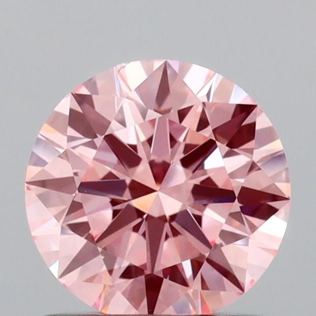 IGI Round 0.92ct Fancy Vivid Pink VVS2 Ideal Loose Lab Diamond: IGI Round 0.92ct Fancy Vivid Pink VVS2 Ideal Loose Lab Diamond Experience the unparalleled beauty of a lab-grown diamond, certified by IGI as Fancy Vivid Pink, VVS2, and EX polished. This stunning