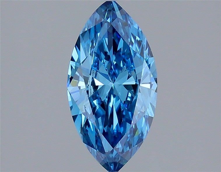 IGI Marquise 1.19ct Fancy Vivid Blue VVS2 Loose Lab Diamond: IGI Marquise 1.19ct Fancy Vivid Blue VVS2 Loose Lab Diamond Experience the rare beauty of a Fancy Vivid Blue lab diamond, boasting an exceptional 1.19ct cut with a vibrant blue hue that shines like a