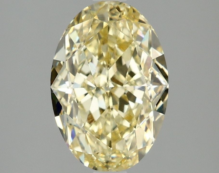 IGI Oval 3.08ct Fancy Intense Yellow VVS2 Loose Lab Diamond: IGI Oval 3.08ct Fancy Intense Yellow VVS2 Loose Lab Diamond Experience the vibrant warmth of a Fancy Intense Yellow diamond, one of the rarest and most coveted colors in nature. This exceptional