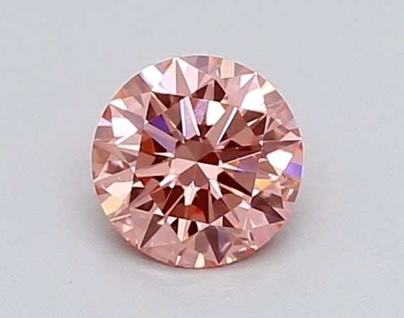 IGI Round 0.38ct Fancy Vivid Pink VVS2 Loose Lab Diamond: IGI Round 0.38ct Fancy Vivid Pink VVS2 Loose Lab Diamond Experience the rare beauty of a Fancy Vivid Pink diamond, one of the most coveted colors in the world of gemstones. This exquisite 0.38ct lab-g