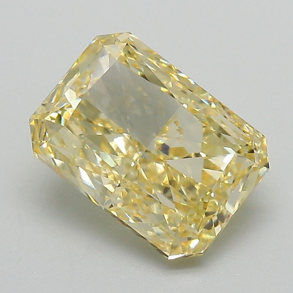 IGI Radiant 3.23ct Fancy Intense Yellow VVS2 Loose Lab Diamond: IGI Radiant 3.23ct Fancy Intense Yellow VVS2 Loose Lab Diamond Experience the vibrant beauty of nature in this stunning 3.23ct Fancy Intense Yellow VVS2 lab-grown diamond, boasting exceptional clarity