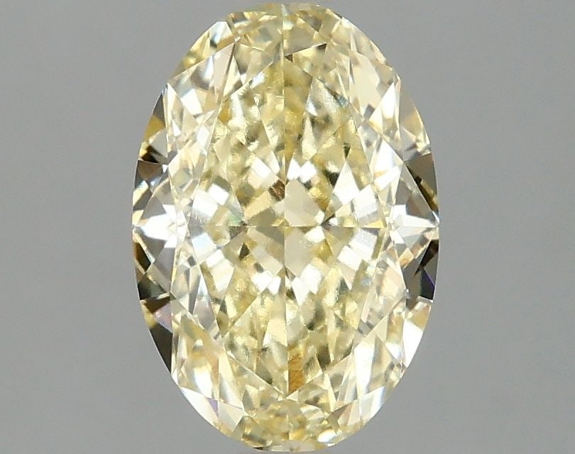 IGI Oval 2.1ct Fancy Intense Yellow VVS2 Loose Lab Diamond: IGI Oval 2.1ct Fancy Intense Yellow VVS2 Loose Lab Diamond A true gem for the discerning collector, this 2.1ct Fancy Intense Yellow VVS2 lab diamond boasts exceptional clarity and color, with an EX