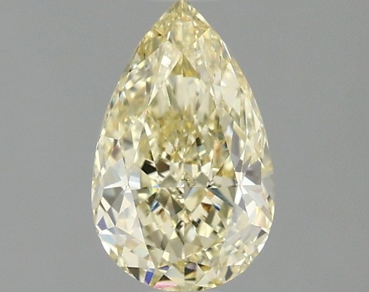 Loose Lab Diamond - IGI Pear 1.06ct Fancy Yellow VVS2: Loose Lab Diamond - IGI Pear 1.06ct Fancy Yellow VVS2 A rare and radiant gem, this 1.06ct Fancy Yellow Lab Diamond boasts exceptional clarity (VVS2) and polish (EX), giving it a dazzling luster that's