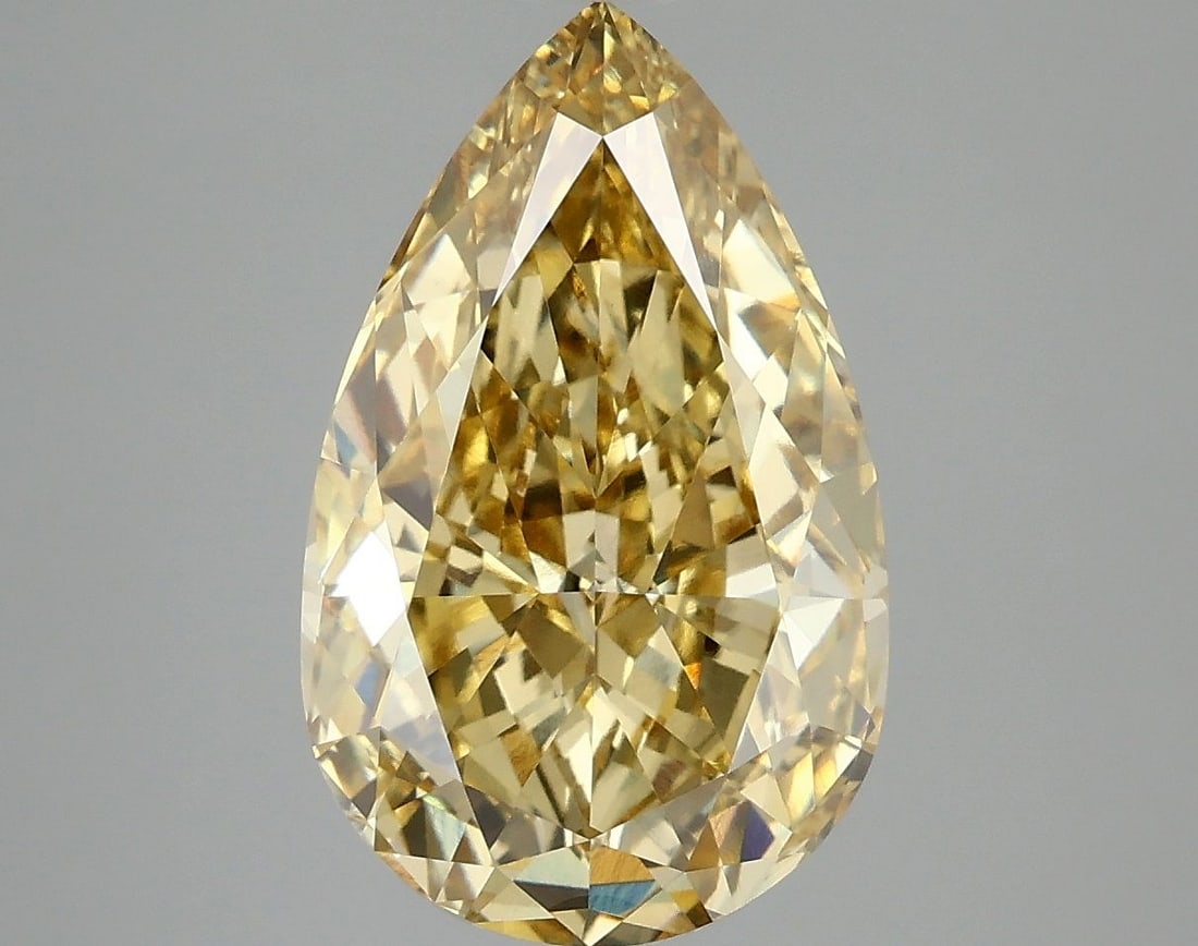 Loose Lab Diamond - IGI Pear 5.09ct Fancy Vivid Yellow VVS2: Loose Lab Diamond - IGI Pear 5.09ct Fancy Vivid Yellow VVS2 Experience the brilliance of nature's own sunshine with this exquisite 5.09ct IGI-certified lab-grown diamond, boasting a vibrant Fancy Vivi