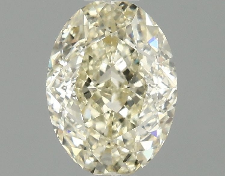 IGI Oval 1.04ct Fancy Light Yellow VVS2 Loose Lab Diamond: IGI Oval 1.04ct Fancy Light Yellow VVS2 Loose Lab Diamond Experience the beauty of a lab-grown diamond, certified by IGI as a Fancy Light Yellow VVS2 Loose Diamond. This stunning 1.04ct gem boasts exc