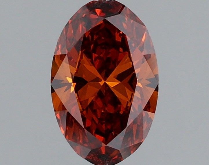 IGI Oval 1.0ct Fancy Vivid Orange VVS2 Loose Lab Diamond: IGI Oval 1.0ct Fancy Vivid Orange VVS2 Loose Lab Diamond Experience the vibrant beauty of a Fancy Vivid Orange diamond, one of the rarest and most unique colors in nature. This 1.0ct IGI-certified lab
