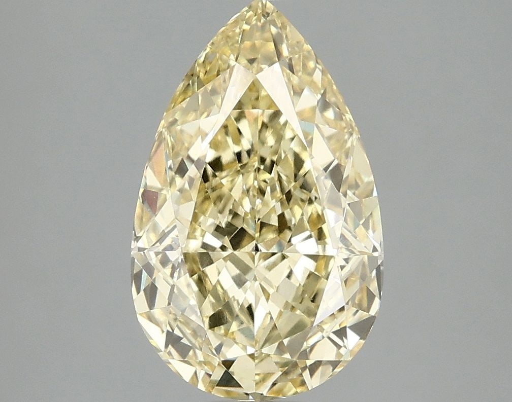 Loose Lab Diamond - IGI Pear 3.09ct Fancy Vivid Yellow VVS2: Loose Lab Diamond - IGI Pear 3.09ct Fancy Vivid Yellow VVS2 Experience the brilliance of a lab-grown diamond, certified by the International Gemological Institute (IGI) as a Fancy Vivid Yellow gemston
