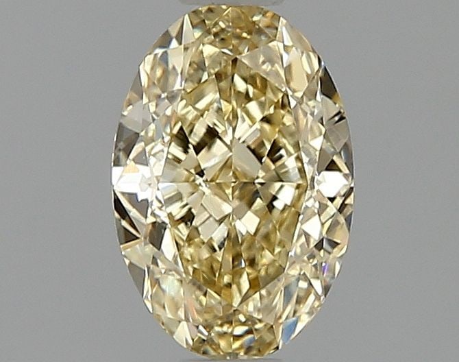 IGI Oval 1.08ct Fancy Intense Yellow VVS2 Loose Lab Diamond: IGI Oval 1.08ct Fancy Intense Yellow VVS2 Loose Lab Diamond Experience the vibrant warmth of a lab-grown fancy intense yellow diamond, certified by the International Gemological Institute (IGI) as