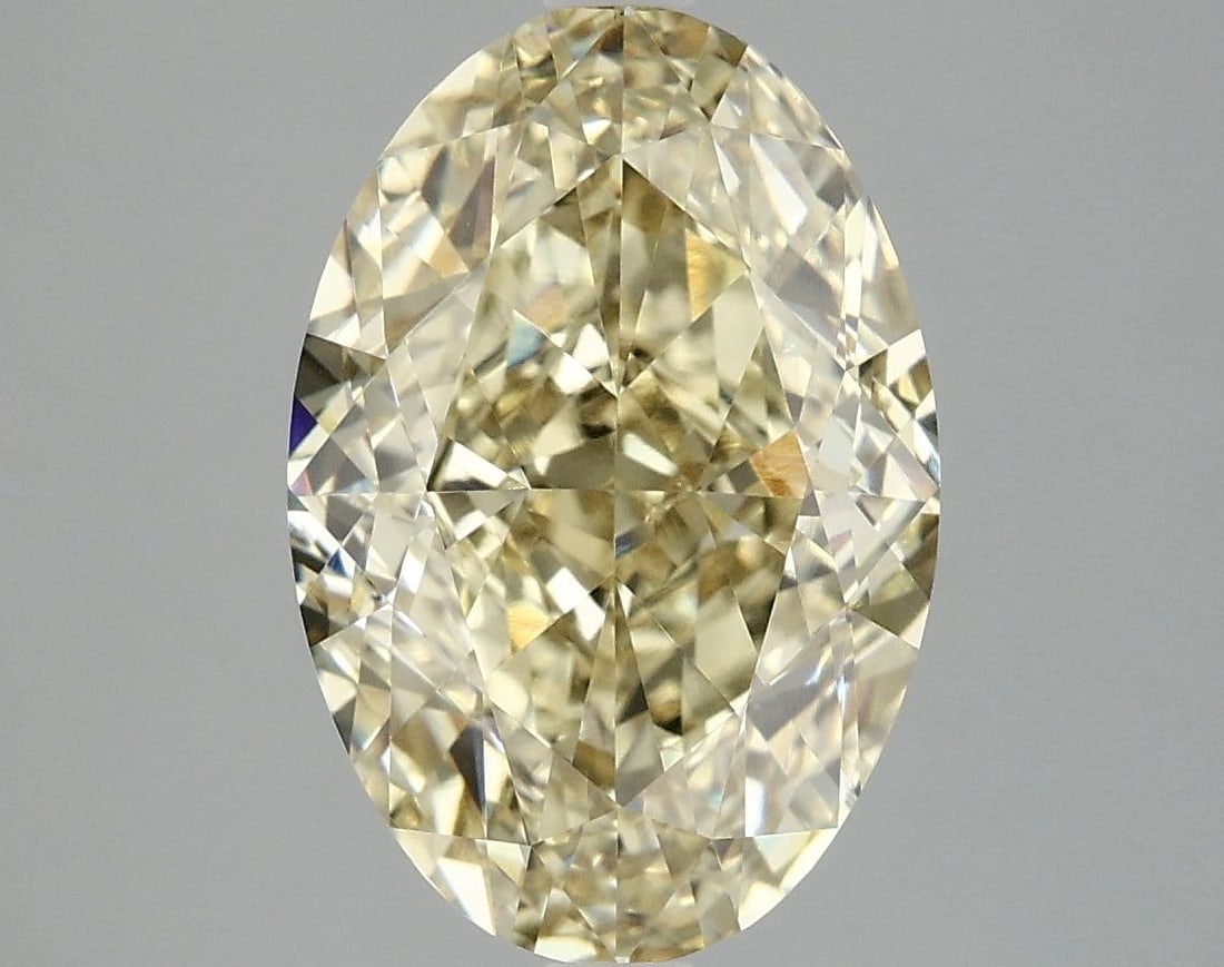 IGI Oval 5.1ct Fancy Intense Yellow VVS2 Loose Lab Diamond: IGI Oval 5.1ct Fancy Intense Yellow VVS2 Loose Lab Diamond Experience the vibrant beauty of nature in this stunning 5.1ct Fancy Intense Yellow VVS2 lab diamond, boasting exceptional clarity and