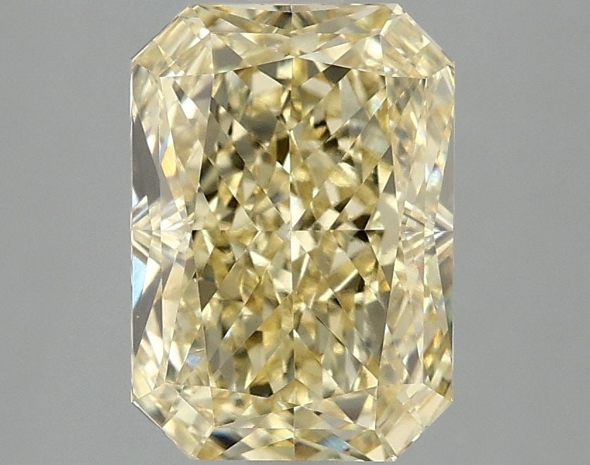 IGI Radiant 3.02ct Fancy Vivid Yellow VVS2 Loose Lab Diamond: IGI Radiant 3.02ct Fancy Vivid Yellow VVS2 Loose Lab Diamond Experience the brilliance of nature's own sunshine with this stunning 3.02ct Fancy Vivid Yellow VVS2 loose lab diamond, certified by IGI an