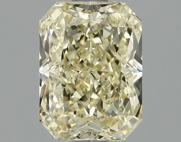 IGI Radiant 1.54ct Fancy Intense Yellow VVS2 Loose Lab Diamond: IGI Radiant 1.54ct Fancy Intense Yellow VVS2 Loose Lab Diamond Experience the vibrant beauty of nature in this stunning 1.54ct Fancy Intense Yellow VVS2 lab-grown diamond, certified by IGI and boastin