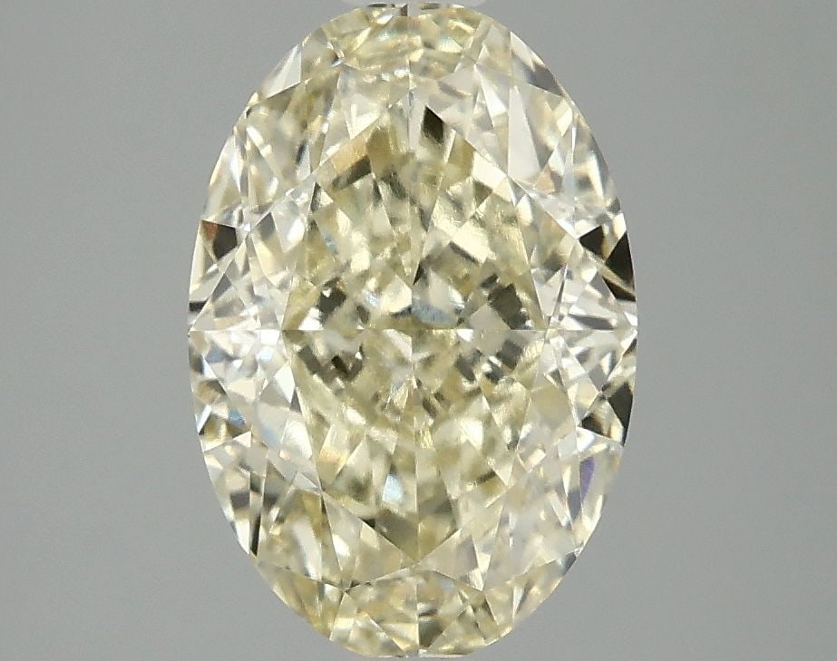 IGI Oval 3.07ct Fancy Intense Yellow VVS2 Loose Lab Diamond: IGI Oval 3.07ct Fancy Intense Yellow VVS2 Loose Lab Diamond Experience the vibrant warmth of a genuine lab-grown fancy intense yellow diamond, certified by IGI and boasting exceptional clarity (VVS2)