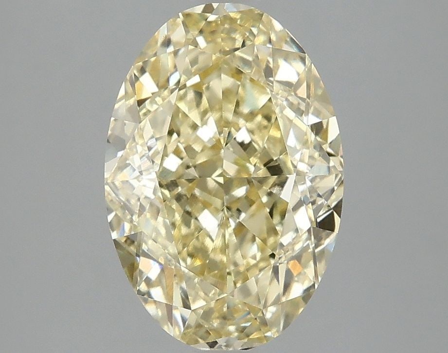 IGI Oval 3.1ct Fancy Intense Yellow VVS2 Loose Lab Diamond: IGI Oval 3.1ct Fancy Intense Yellow VVS2 Loose Lab Diamond Experience the vibrant beauty of nature in this stunning 3.1ct Fancy Intense Yellow VVS2 lab-grown diamond, certified by the International Ge