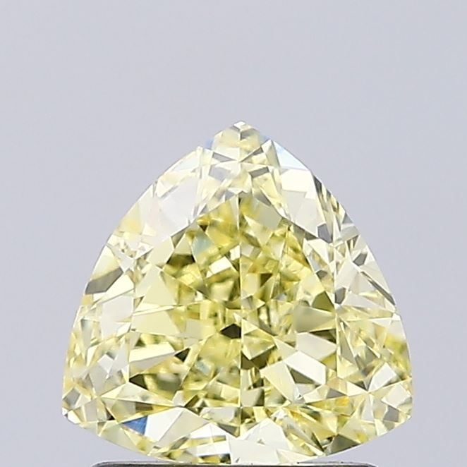 IGI Triangular 1.21ct Fancy Yellow VVS2 Loose Lab Diamond: IGI Triangular 1.21ct Fancy Yellow VVS2 Loose Lab Diamond Experience the unique beauty of a lab-grown Fancy Yellow diamond, certified by IGI as VVS2 in clarity and boasting exceptional polish and symm