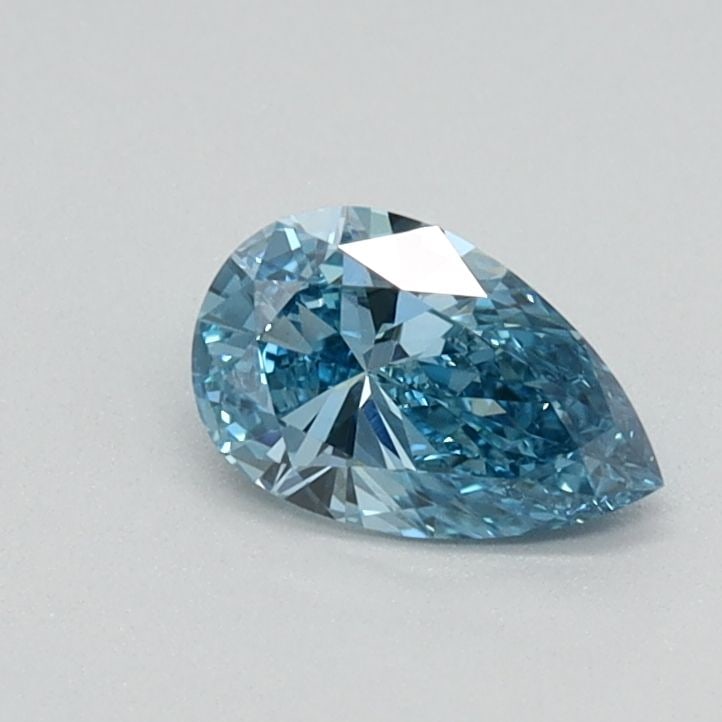 Loose Lab Diamond - IGI Pear 0.31ct Fancy Vivid Blue VVS2: Loose Lab Diamond - IGI Pear 0.31ct Fancy Vivid Blue VVS2 Experience the breathtaking beauty of a lab-grown diamond, certified by the International Gemological Institute (IGI) as Fancy Vivid Blue,
