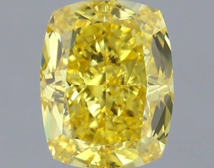 Loose Lab Diamond - IGI Cushion Modified 1.07ct Fancy Vivid Yellow VVS2: Loose Lab Diamond - IGI Cushion Modified 1.07ct Fancy Vivid Yellow VVS2 A rare and radiant gem, this 1.07ct Fancy Vivid Yellow Lab diamond boasts exceptional clarity, with its VVS2 grade ensuring