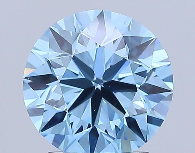 IGI Round 2.45ct Fancy Vivid Blue VVS2 Loose Lab Diamond: IGI Round 2.45ct Fancy Vivid Blue VVS2 Loose Lab Diamond Experience the rare beauty of a Fancy Vivid Blue lab-grown diamond, boasting exceptional clarity (VVS2) and polish (EX), with a vibrant blue hu
