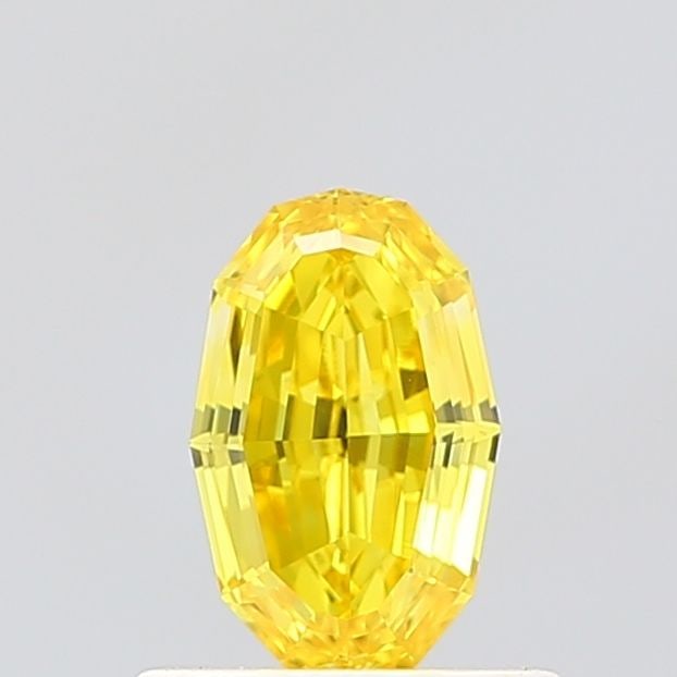 IGI Oval 0.61ct Fancy Vivid Yellow VVS2 Loose Lab Diamond: IGI Oval 0.61ct Fancy Vivid Yellow VVS2 Loose Lab Diamond Experience the vibrant beauty of nature in this stunning 0.61ct Fancy Vivid Yellow VVS2 lab-grown diamond, certified by the International Gemo