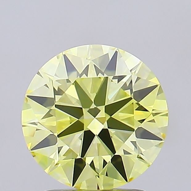 0.7ct Fancy Vivid Yellow VVS2 Lab Diamond: 0.7ct Fancy Vivid Yellow VVS2 Lab Diamond Experience the brilliance of nature's own sunshine with this 0.7ct Fancy Vivid Yellow VVS2 lab diamond, boasting an EX cut, EX polish, and EX symmetry that sh