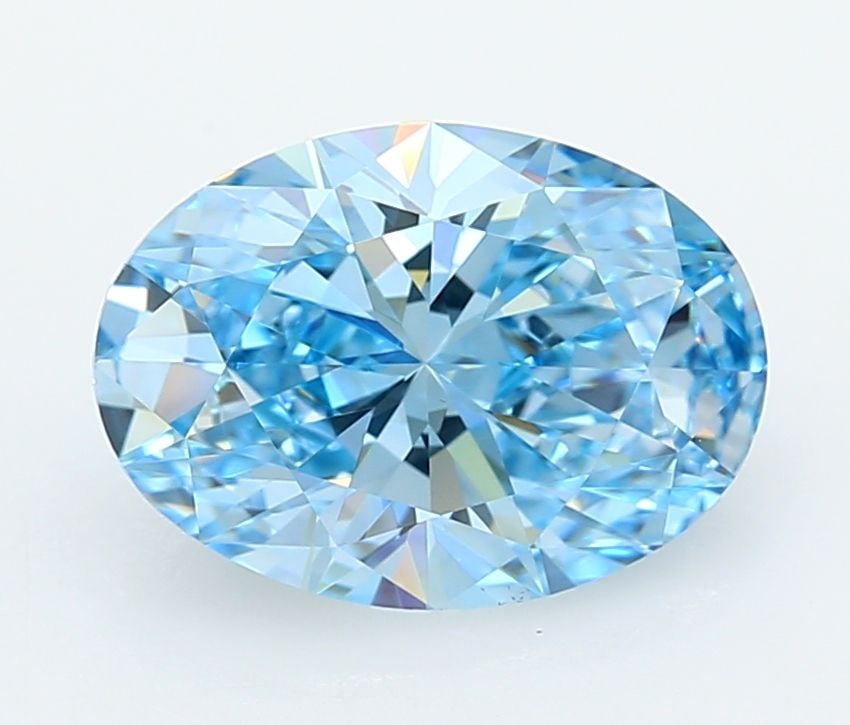 IGI Oval 3.01ct Fancy Vivid Blue VVS2 Loose Lab Diamond: IGI Oval 3.01ct Fancy Vivid Blue VVS2 Loose Lab Diamond Experience the rare beauty of a Fancy Vivid Blue diamond, one of the most sought-after colors in the world of gemstones. This stunning 3.01ct IG
