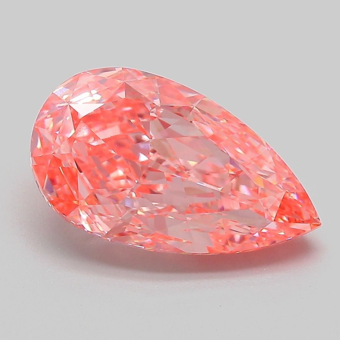 Loose Lab Diamond - IGI Pear 4.07ct Fancy Vivid Pink VVS2: Loose Lab Diamond - IGI Pear 4.07ct Fancy Vivid Pink VVS2 Experience the rare beauty of a lab-grown diamond, certified by the International Gemological Institute (IGI) as Fancy Vivid Pink, with